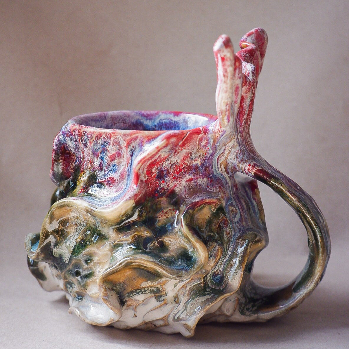 Handcrafted mermaid mug with a beautifully glazed finish, featuring a whimsical tail-shaped handle and ocean-inspired design, perfect for adding a touch of enchantment to your morning routine