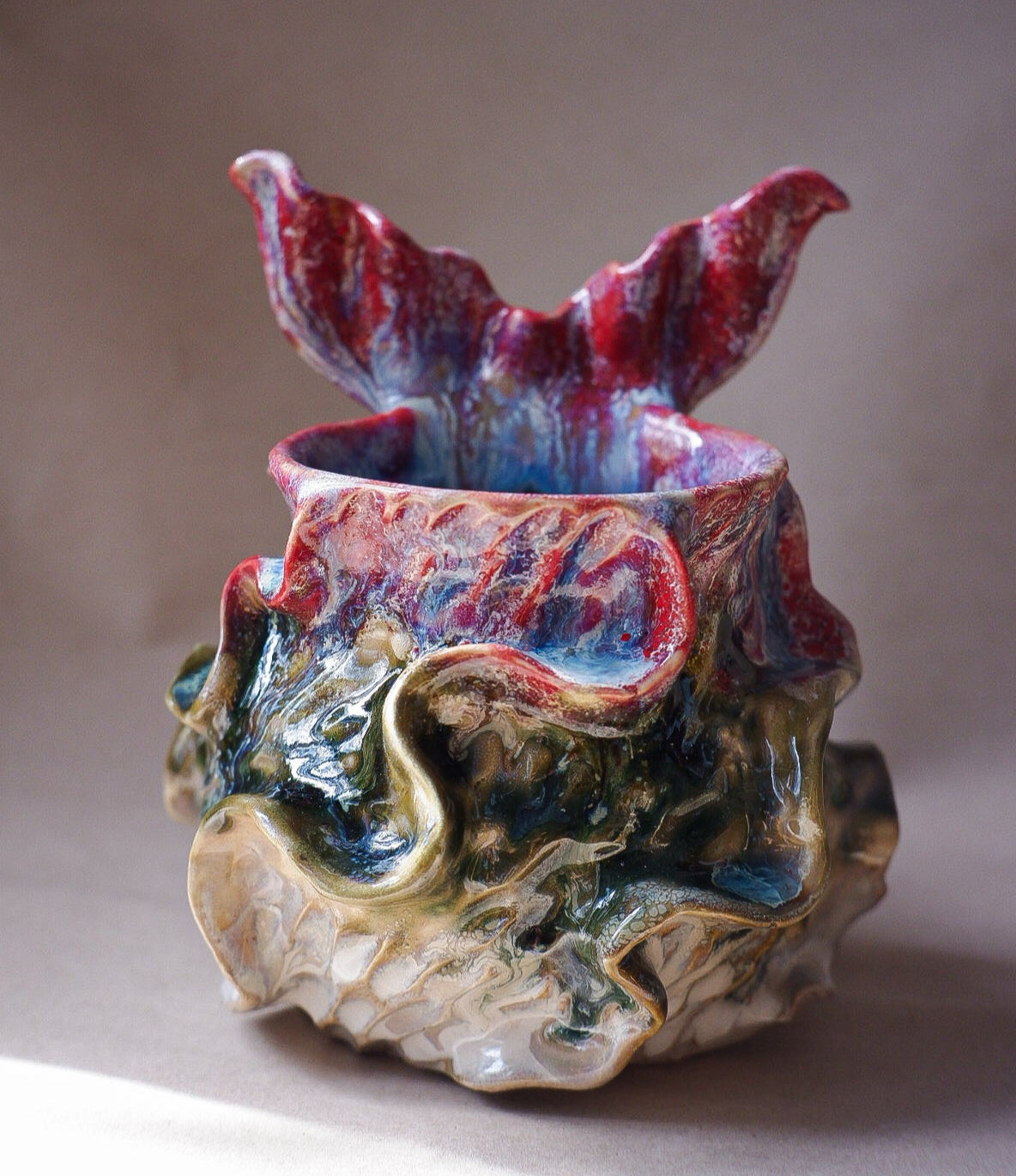 Handcrafted mermaid mug with a beautifully glazed finish, featuring a whimsical tail-shaped handle and ocean-inspired design, perfect for adding a touch of enchantment to your morning routine