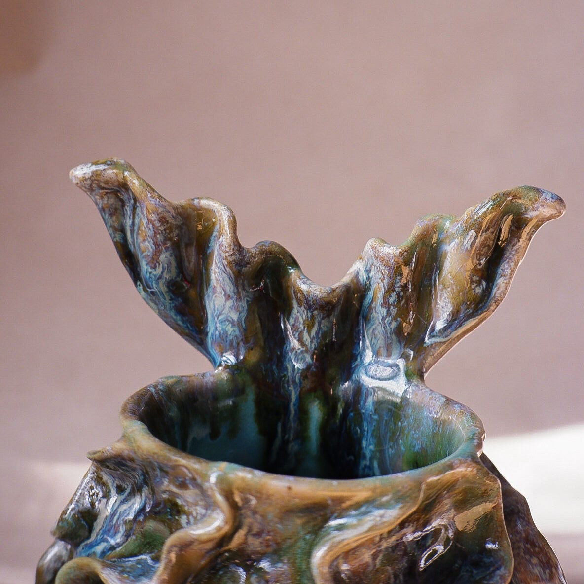 Handcrafted mermaid mug with a beautifully glazed finish, featuring a whimsical tail-shaped handle and ocean-inspired design, perfect for adding a touch of enchantment to your morning routine