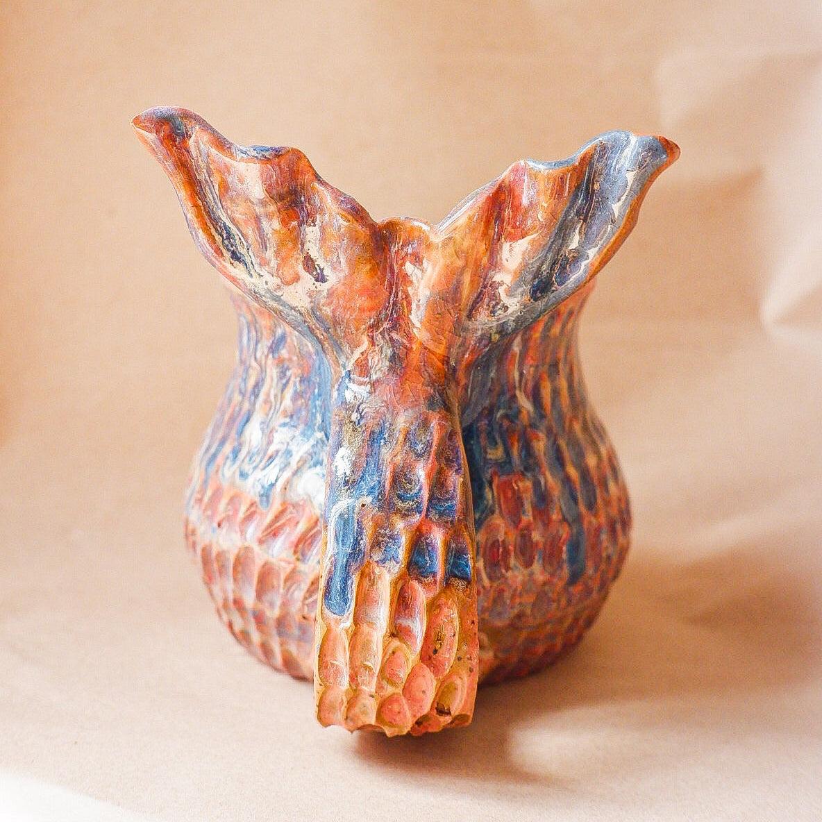Handcrafted mermaid mug with a beautifully glazed finish, featuring a whimsical tail-shaped handle and ocean-inspired design, perfect for adding a touch of enchantment to your morning routine