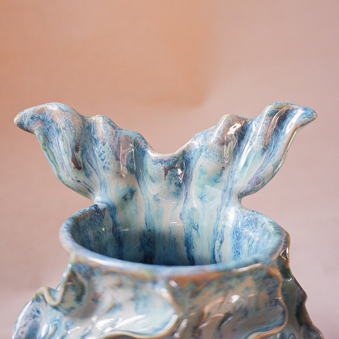 Handcrafted mermaid mug with a beautifully glazed finish, featuring a whimsical tail-shaped handle and ocean-inspired design, perfect for adding a touch of enchantment to your morning routine