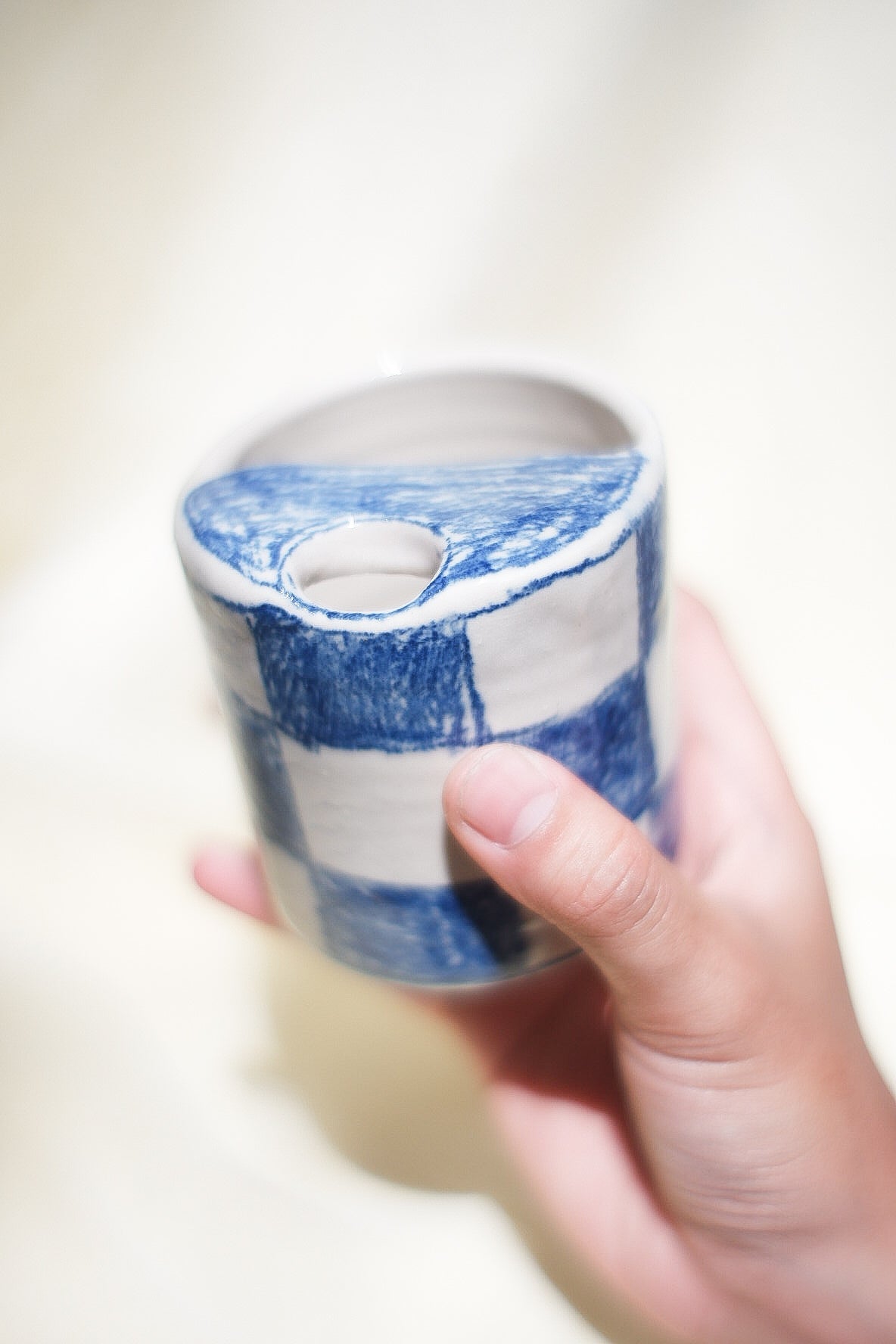 Blue checkered sippy tumbler